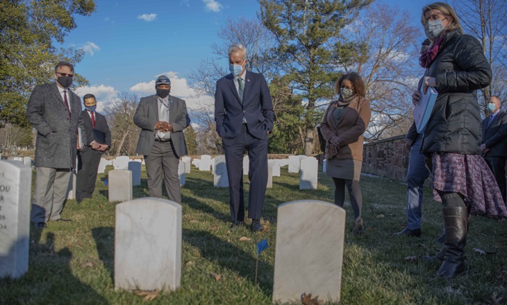 IMAGE: VA Secretary Denis McDonough receiving an overview of the Alexandria National Cemetery from NCA Historian, Ms. Jennifer Perunko