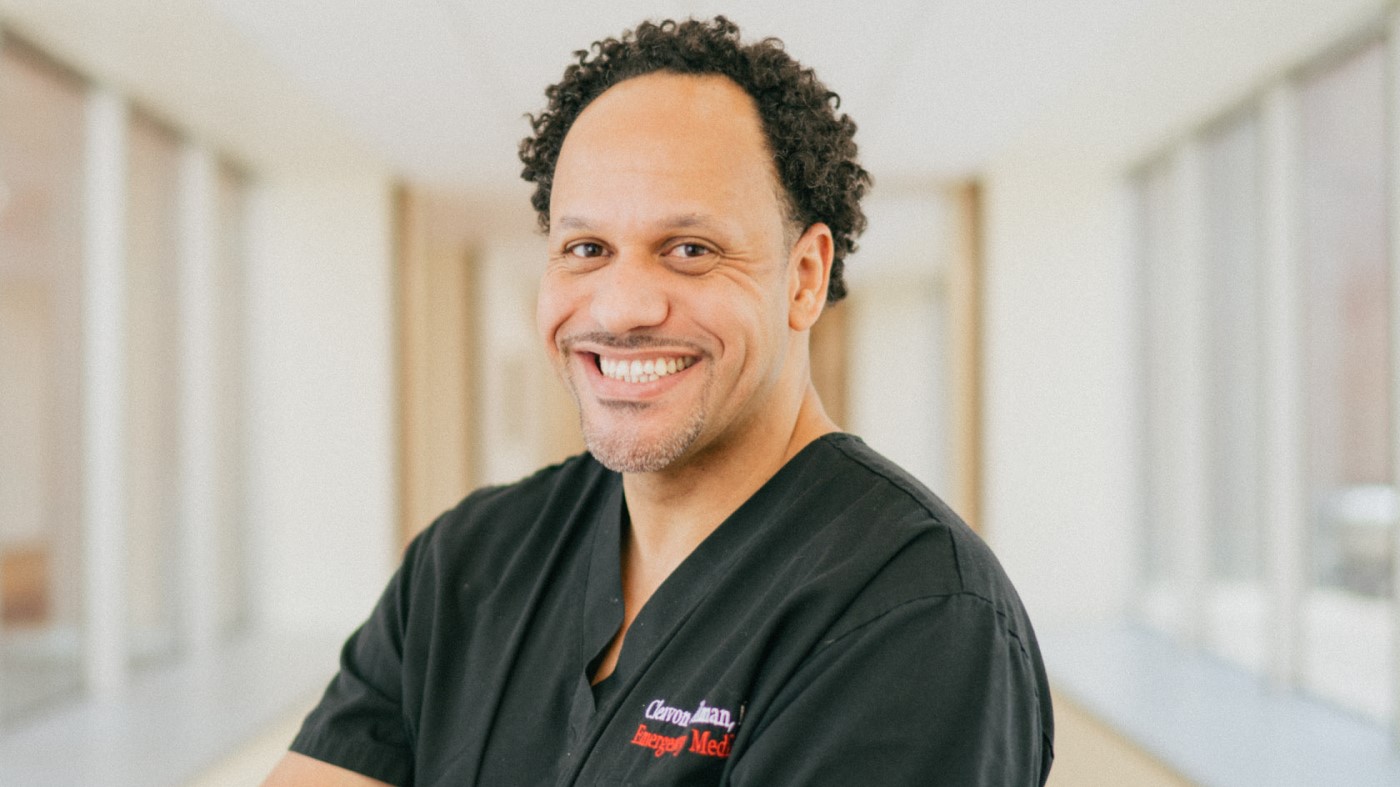 A smiling man.